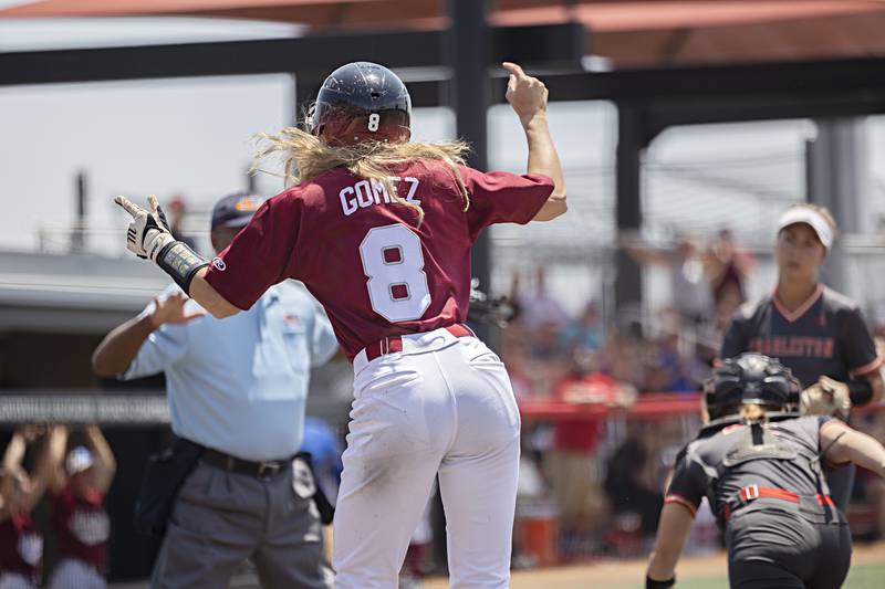 Antioch’s Miranda Gomez celebrates scoring on a bunt against Charleston Friday, June 9, 2023 in the class 3A state softball semifinal.