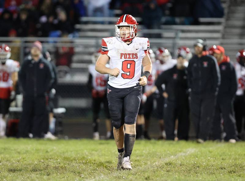 Yorkville’s Michael Dopart (9) runs back onto the field against Yorkville during the boys varsity football game on Friday, Oct. 6, 2023 in Oswego.