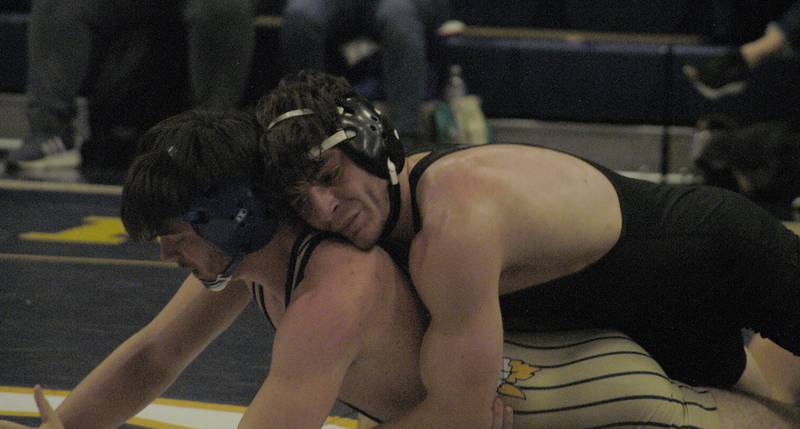 Sterling's Gage Tate (bottom) waits out Dixon's Steven Kitzman (top) in the 175-pound championship round. The action took place on Saturday, Dec. 2, 2023, at Sterling High School's 45th Annual Carson DeJarnatt Tournament.
