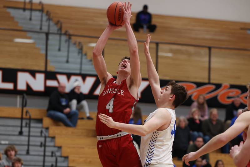 Hinsdale Central’s Chase Collignon battles for the shot against Lincoln-Way East in the Lincoln-Way West Warrior Showdown on Saturday January 28th, 2023.