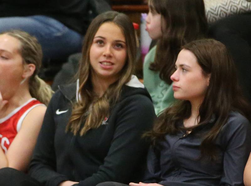 Ottawa junior Marlie Orlandi watches a game against Princeton earlier this season. The Pirates' leading scorer as a sophomore, Orlandi suffered a season-ending injury last summer, but it didn't stop the all-state guard from contributing despite not being on the court.