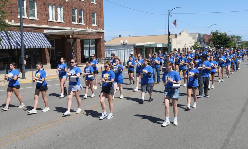 Princeton High School and Logan Junior High School bands walk in procession down South Main Street during the Memorial Day service on Monday, May 25, 2026 in Princeton.