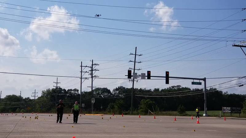 Investigators with the McHenry Police Department spent hours taking photos and gathering evidence at the intersection of Route 31 and Bull Valley Road on Sunday, Aug. 29, 2021, after a report of shots fired in the area.