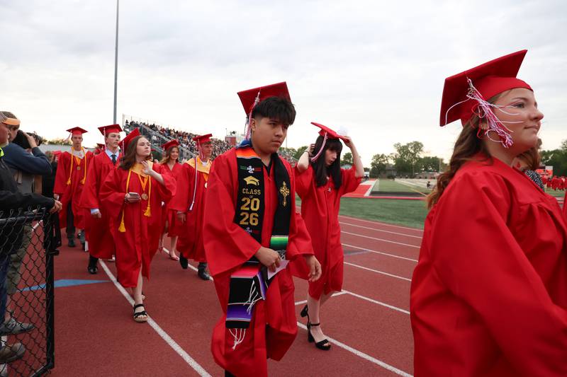 Graduates enter the stadium ahead of the Bradley-Bourbonnais Community High School commencement ceremony on Thursday, May 21, 2026.