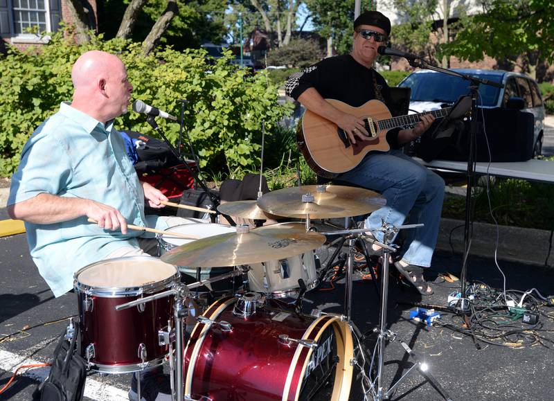 (left) Tim Wilsey of Downers Grove and John Boda of Joliet perform for people attending the Last Straw event held at the Gregg House Museum Sunday Oct. 2, 2022.