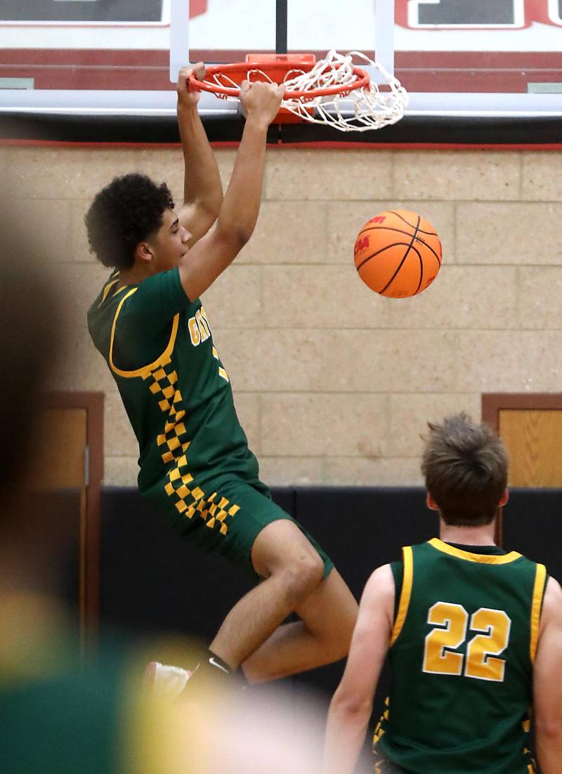 Crystal Lake South's Noah Cook dunks the ball during a Fox Valley Conference boys basketball game against Huntley on Wednesday, Dec. 10, 2025, at Huntley High School.