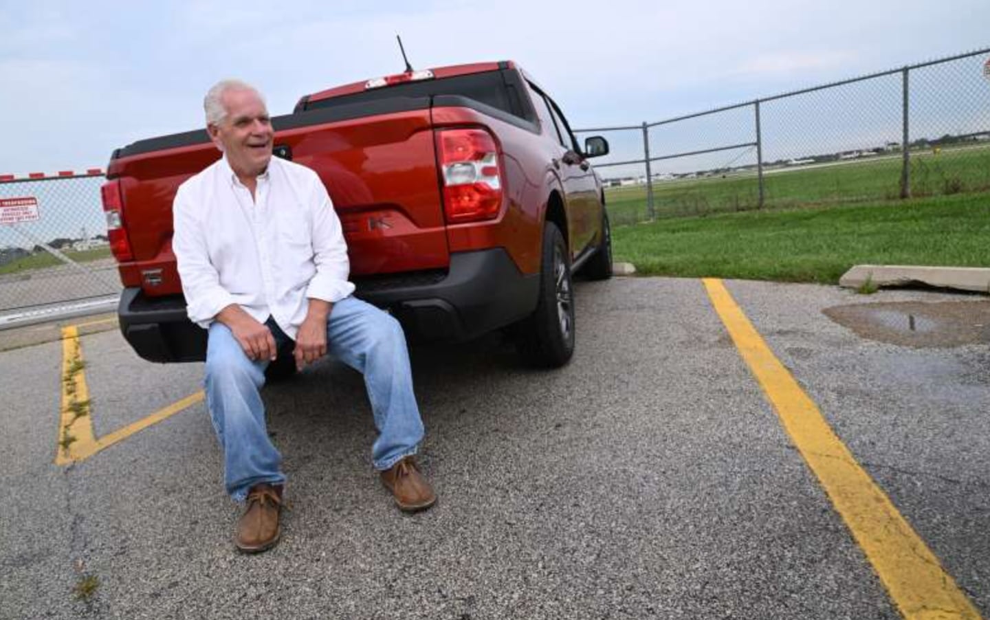 Bill Winquist of Mount Prospect found a wallet containing more than $5,700 at the Chicago Executive Airport viewing area while he was killing time before an appointment. Winquist is shown at the spot where he found the wallet.