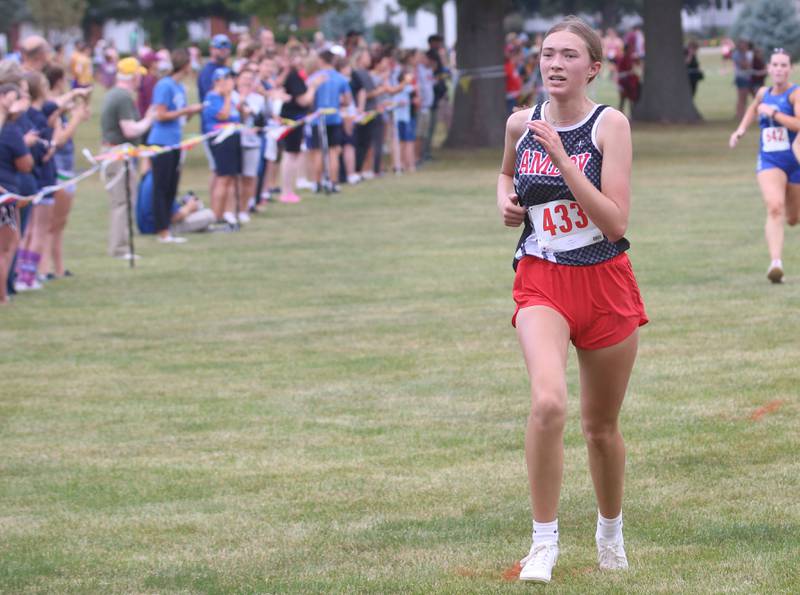 Amboy's Scarlett Payne competes during the Gary Coates Invitational cross country meet on Saturday, Sept. 13, 2025 at Zearing Park in Princeton .