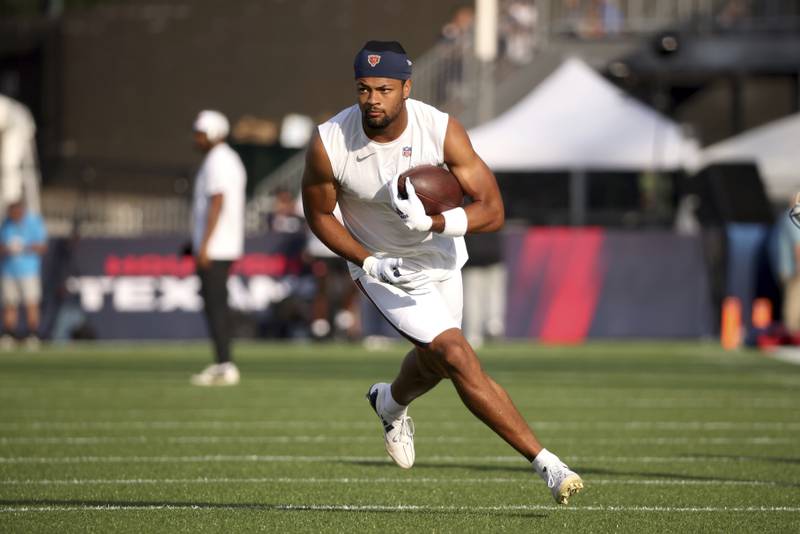 Chicago Bears wide receiver Rome Odunze (15) warms up prior to the start of an NFL preseason football game against the Houston Texans in August 2024 in Canton, Ohio.