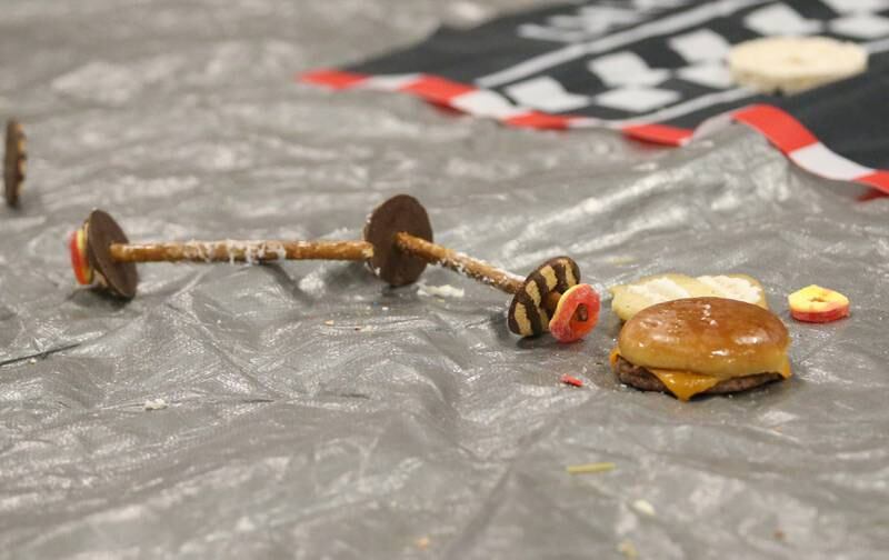 An edible car disintegrates at the bottom of the ramp during the 18th annual Editable Car Contest on Wednesday, Feb. 28, 2024 at Illinois Valley Community College in Oglesby.