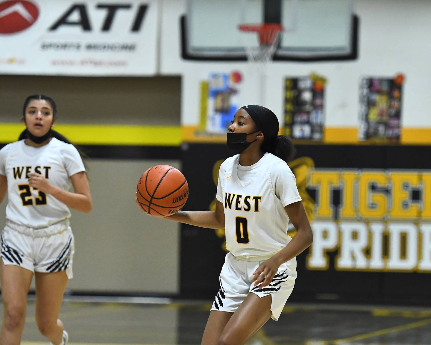 Joliet West Tigers Lisa Thompson (0) brings the ball up court against Providence Celtics on Thursday, Feb. 10, 2022, at Joliet .