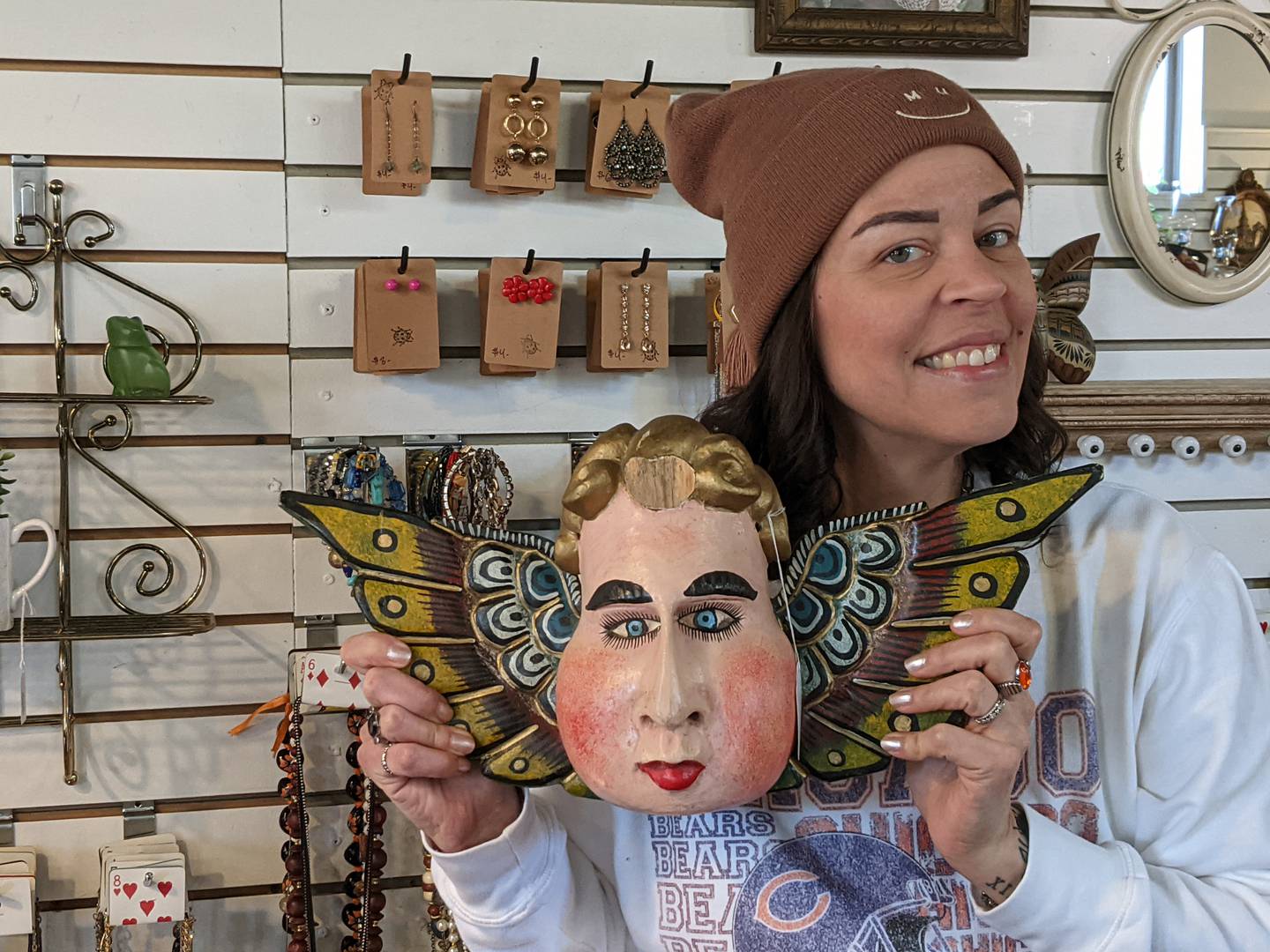 Otts & Ends founder Stephanie Ott shows one of the more unique items for sale at the store.