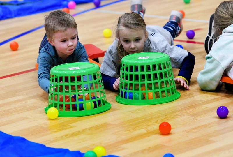 Alana and Allen Smith, ages 7 and 5, of Leaf River take part in the Blackhawk Crossing 4-H Club's game of 'Hungry Hippo' during the Penny Carnival on Saturday, March 18 at the Blackhawk Center in Oregon. The family-fun event is a fundraiser for the 4-H program.