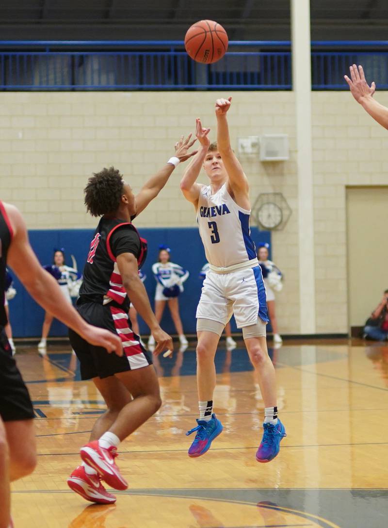 Geneva’s Elliot Kroeyr (3) shoots a three pointer against Batavia during a basketball game at Geneva High School on Friday, Dec 15, 2023.