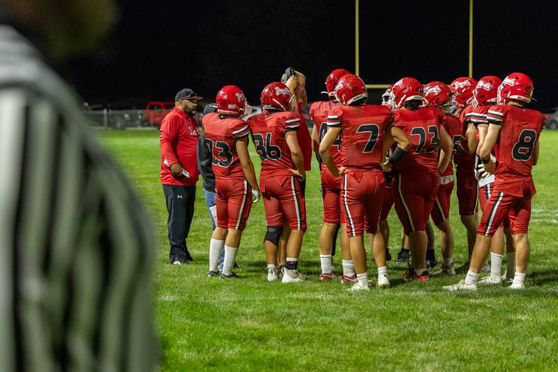 Hall's football team huddle on Friday, Sept 5, 2025 at Richard Nesti Stadium in Spring Valley.