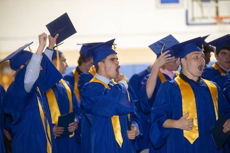 Newman High School graduates turn their tassels and celebrate after receiving their diplomas Wednesday, May 18, 2022 at the school.