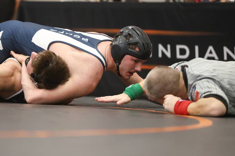 Plainfield South’s Ryker Czubak pins Joliet Catholic’s Mason Bucon in the Class 3A Minooka Regional 215 pound championship on Saturday, Jan. 31, 2026 in Minooka.