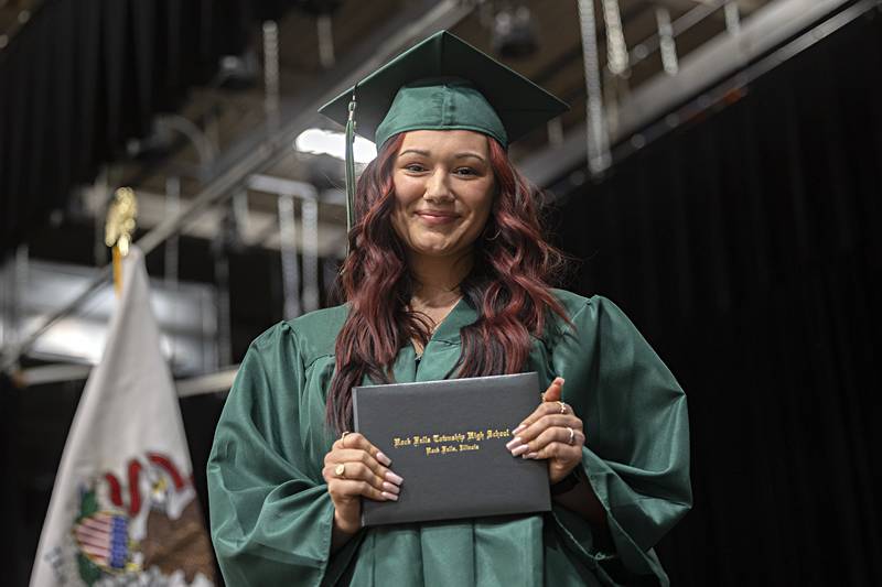 Alizae Clark displays her diploma Sunday, May 28, 2023 at Rock Falls High School’s 144th commencement ceremony.