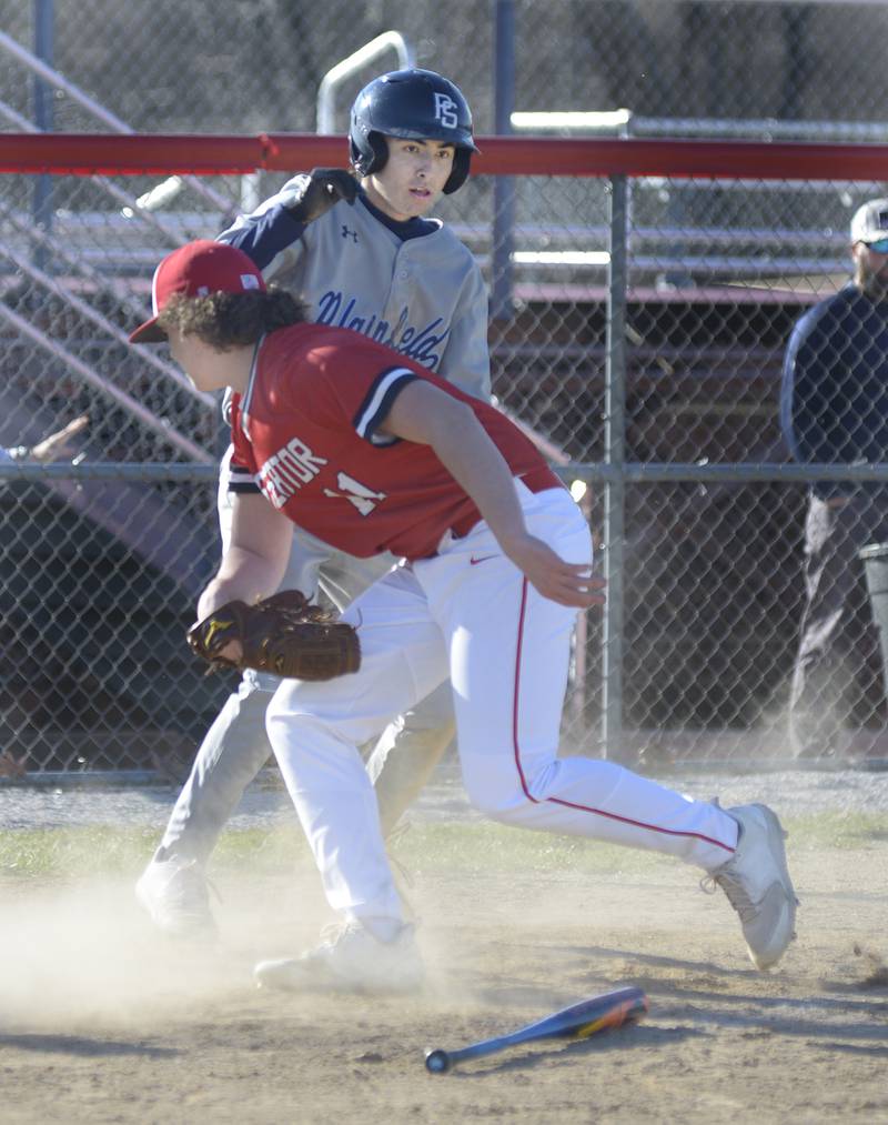 Streator pitcher Jacob Hagie is late with a tag at home from a past ball in the 3rd inning Tuesday against Plainfield at Tuesday.