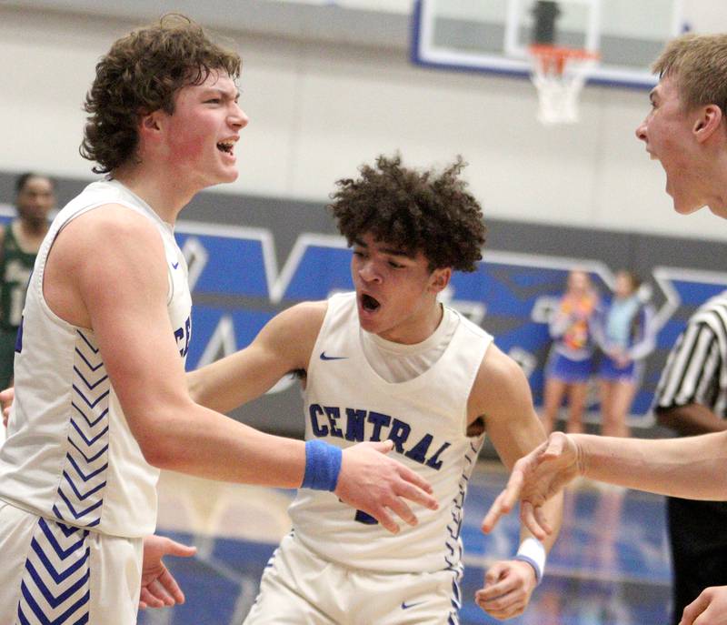 From left, Burlington Central’s Nicholas Gouriotis, Caden West, and Drew Scharnowski enjoy building a large early lead against Rockford Boylan in IHSA Class 3A Sectional action at Burlington Central High School Wednesday night.