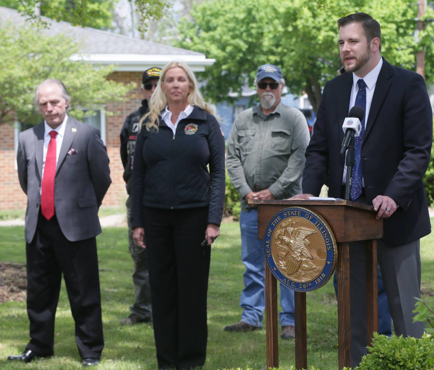 State Rep. David Welter R-Morris  speaks with other state senators Craig Wilcox, R-McHenry, and Sue Rezin, R-Morris, at the Illinois Veterans Home in La Salle on Monday May 6, 2021.