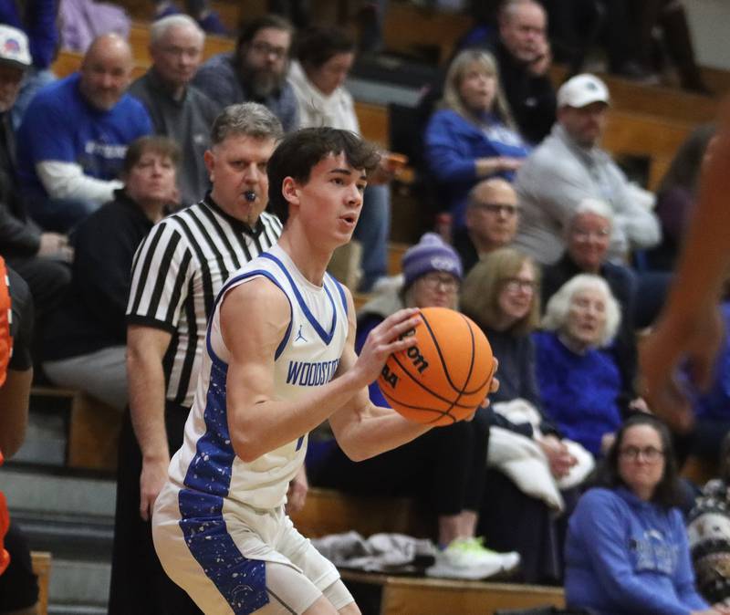 Woodstock’s Collin Greenlee takes a three-point shot against Sandwich in varsity boys basketball on Tuesday, Feb. 11, 2025, at  Woodstock High School in Woodstock.