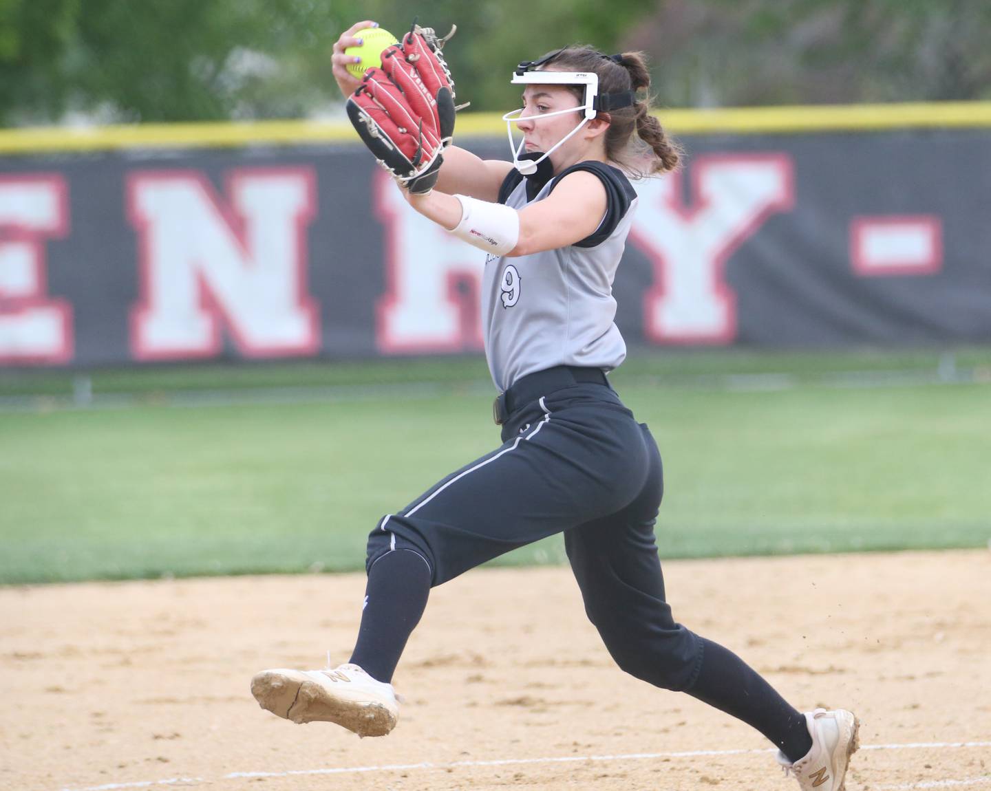 Woodland/Flanagan-Cornell ace Shae Simons delivers a pitch to Henry-Senachwine late in the 2023 season in Henry.