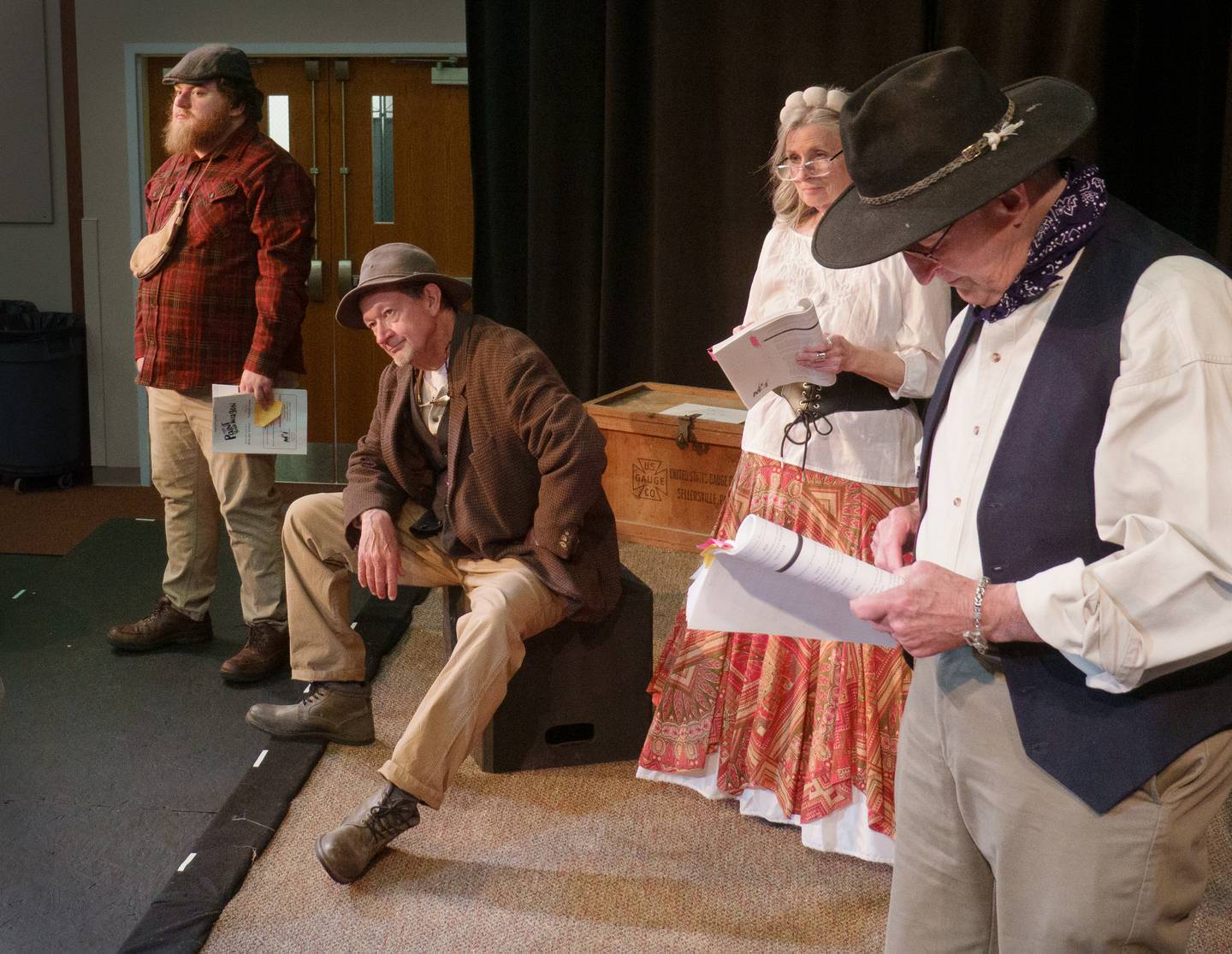 Performing Arts Guild (PAG) actors Dylan Olson, John Chase, Priscilla Osborne and Chris Martin rehearse their lines for their upcoming musical production, “Paint Your Wagon”.  Performance dates are April 17-19 and April 24-26 at the Allure of Pinecrest Grove Community Theatre.  Tickets may be purchased online at performingartsguild.com or by calling 815-734-2103.