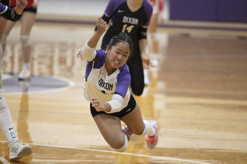 Dixon’s Yui Santos dives to save a ball against Oregon Thursday, Oct. 9, 2025.