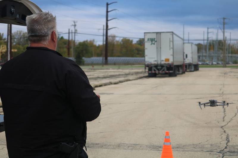 DeKalb Police Department Commander Craig Woodruff flies a drone in the air Oct. 22, 2025, outside the former GE plant in DeKalb.