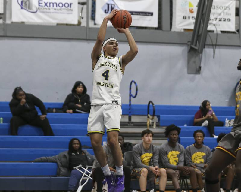 Yorkville Christian's Tray Alford (4) shoots a step back three during their basketball game between Christ the King at Yorkville Christian, Feb 6, 2026 in Yorkville.