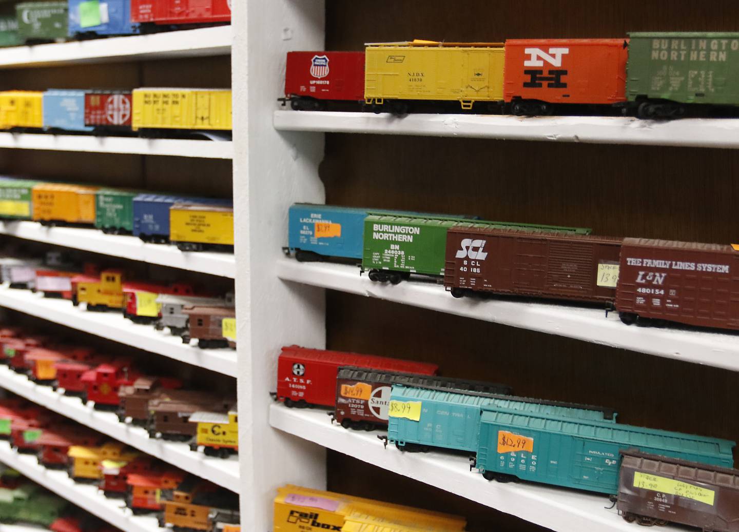 Train cars for sale at M.D. Trains in Woodstock. The model train and die-cast car shop has been fixture on the Woodstock Square for a few years and draws visitors in to check out the rotating display of trains in the front window.