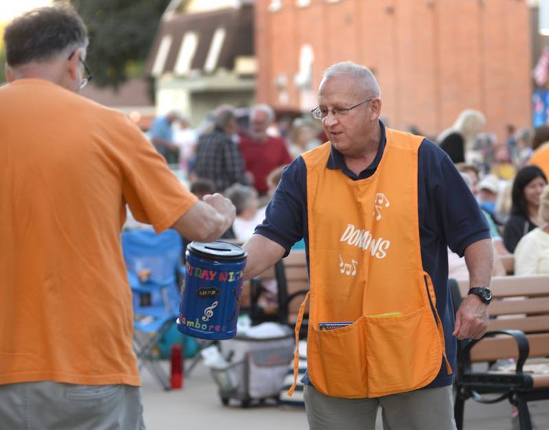 Mike Fay collects donations during intermission of the Jonny Lyons and the Pride concert at the Mt Morris Jamboree on Friday, June 27, 2025.