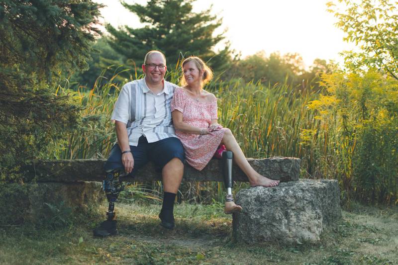 Tom Carlson, a patient services representative at Edward-Elmhurst Health, is seen with his wife, Kim, who is also an amputee. Carlson runs an online support group for people with amputations.