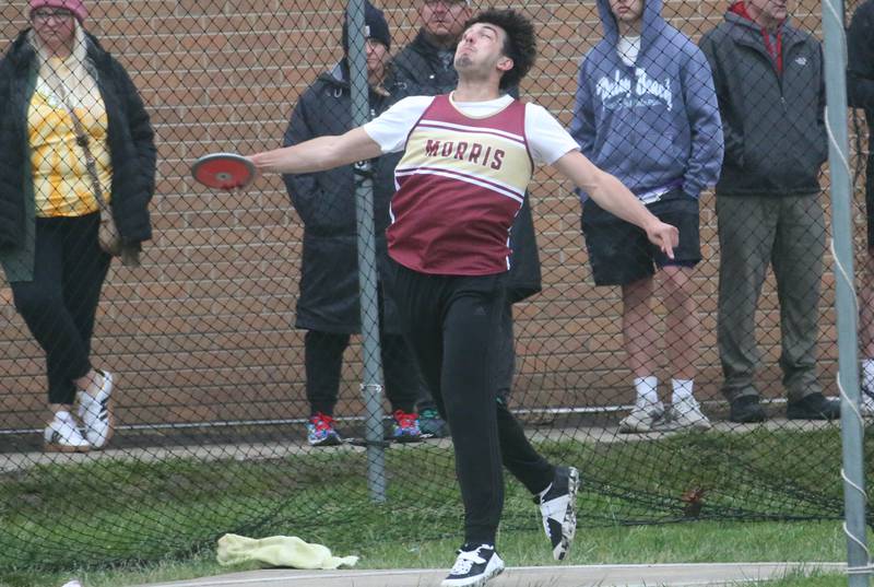 Morris's Kohen Gross throws discus during the Class 2A Sectional meet on Wednesday, May 21, 2025 at Pontiac High School.