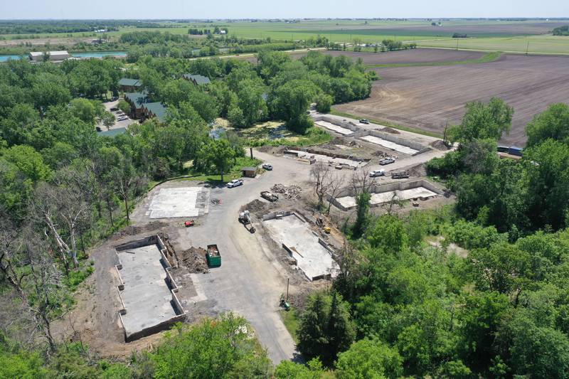 An aerial view of the site where a major fire broke out one-year later at Grand Bear Resort at Starved Rock on Friday, May 28, 2023 . Foundations have been poured and crews are beginning to rebuild after the fire.