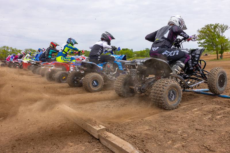 Local rider Gage Beebe (99), who grew up around the course, shoots out of the starting area after the gate is dropped for the Pro-Am race division during the ATVMX Championship race on May 24, 2025 at Sunset Ridge MX in Walnut.
