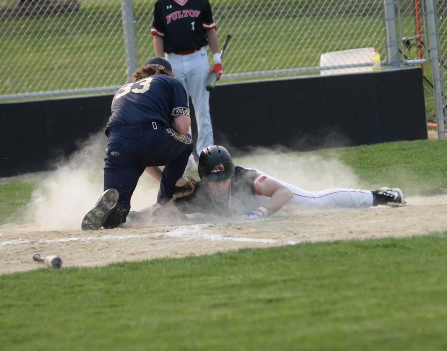 Polo's  Scott Robertson tags out Fulton's Aj Boardman at home plate during regional action in Forreston on Wednesday, May 17.