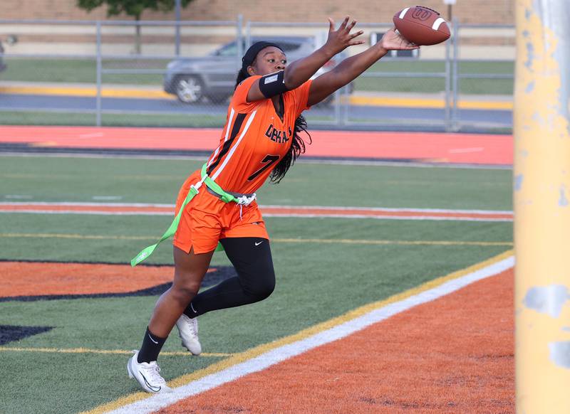 DeKalb's Kayden Johnson tries to keep her feet inbounds while catching a pass Monday, Aug. 25, 2025, during their game against Belvidere at DeKalb High School. The contest marked the first ever game for the girls flag football program at DeKalb.