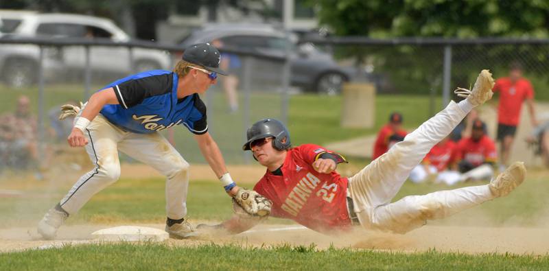 Batavia's Grant Wardynski (25) dives safely into 3rd after St. Charles North's Jake Kujak (15) comes up late on the tag during the Geneva Regional Championship on Saturday, May 27, 2023.