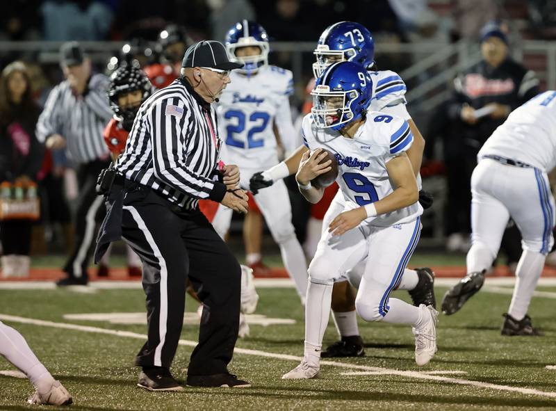 Riverside Brookfield's Braeden Novak (9) runs the ball during the varsity football game between Riverside Brookfield and Glenbard East on Friday, Oct. 24, 2025 in Lombard, IL.