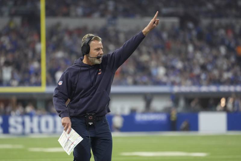 Chicago Bears head coach Matt Eberflus signals during the first half of an NFL football game against the Indianapolis Colts Sunday, Sept. 22, 2024, in Indianapolis. (AP Photo/Michael Conroy)