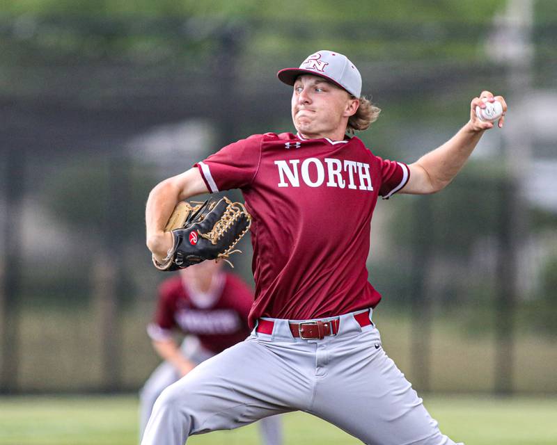 Plainfield North's Kash Koslowski (8) delivers to the plate during Class 4A Romeoville Sectional semifinal game between Plainfield North at Oswego.  June 1, 2023.