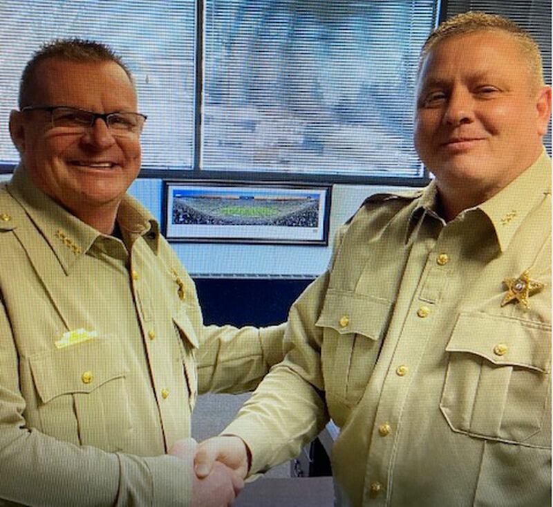 Whiteside County Sheriff John Booker announces the hiring of chief deputy, former Rock Island chief of police Jeffrey R. VenHuizen.