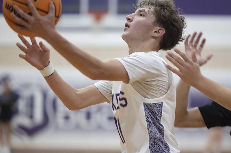 Dixon’s Brody Nicklaus puts up a shot against Kewanee Tuesday, Dec. 2, 2025.