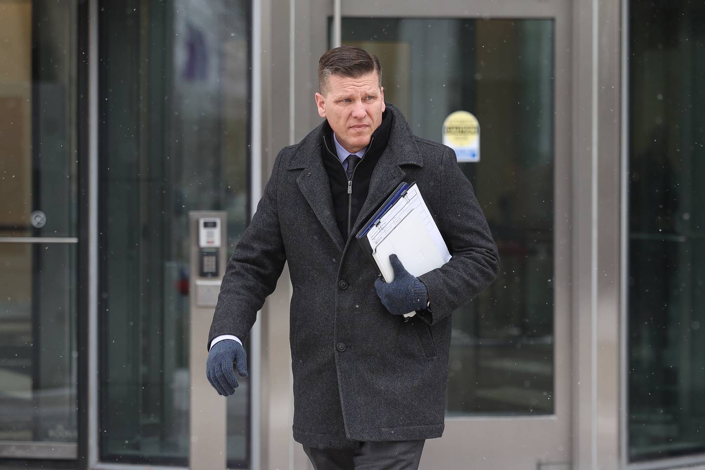 Attorney Dan Walsh leaves the Will County Courthouse after the  arraignment of his client John Fleet on Wednesday, Jan 22, 2025 in Joliet. Fleet is charged for the death of Illinois State Trooper Clay Carns after hitting the trooper along Interstate 55 on Dec. 23, 2024.