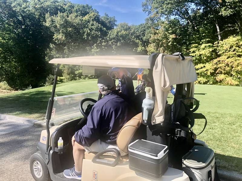 Bureau Valley's Wyatt Novotny talks to Storm coach Jack Gustafson at TPC Deere Run Monday.
