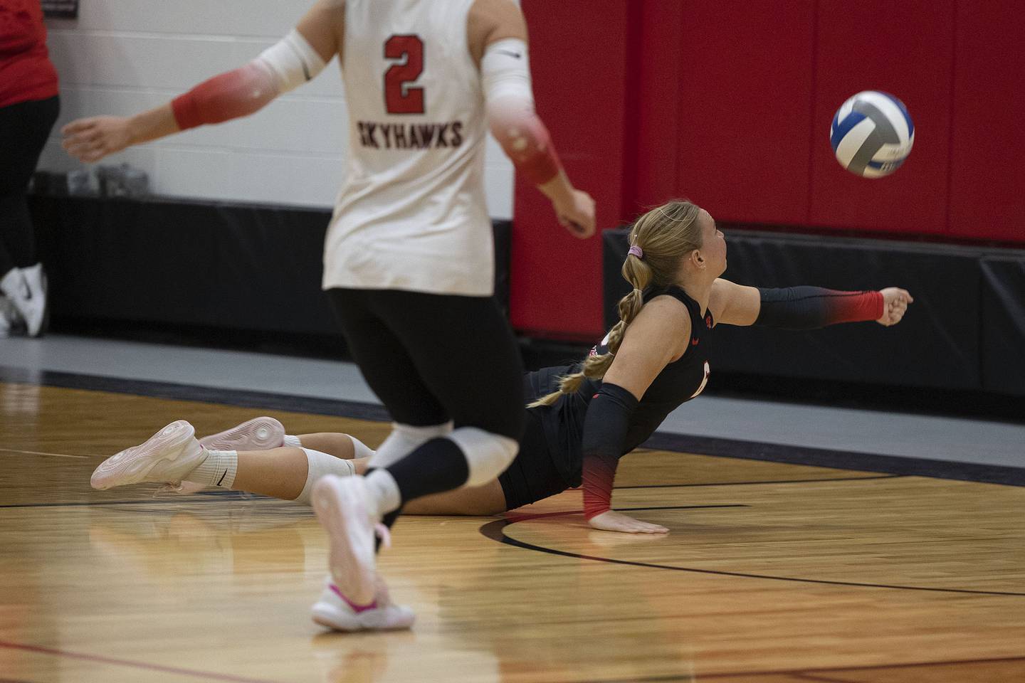 Sauk Valley’s Jess Johns dives to play a ball against Triton College Wednesday, Nov. 5, 2025, during the Regional IV tournament.