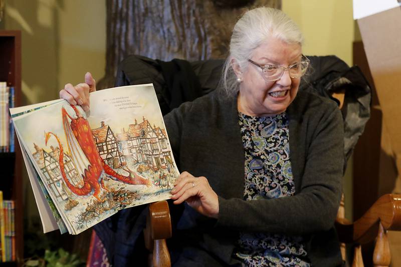 Bette Chwalisz, a retired teacher, reads “The Story Book Knight” on Thursday, Feb, 20, 2025, at Read Between The Lynes in Woodstock during the bookshop's weekly story time.