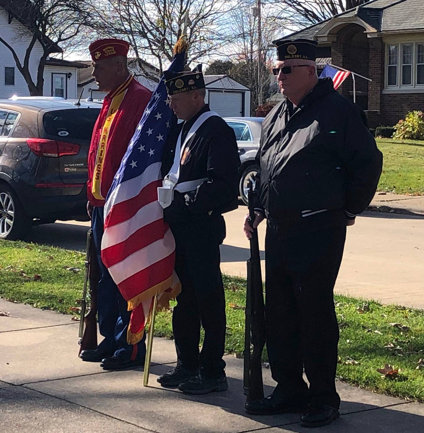 Veterans at Ogelsby Memorial park honor all who have served defending the country with a presentation of flags on Friday, Nov. 22, 2022.